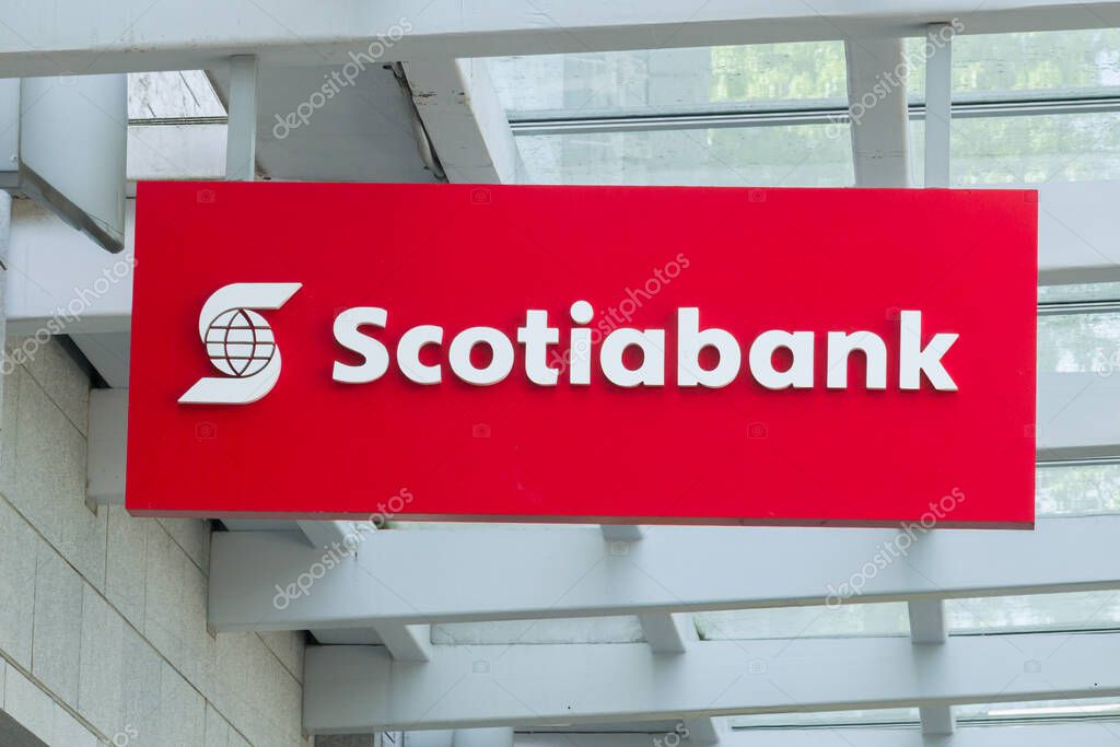VANCOUVER, BC, CA, MAY 27, 2025: Scotiabank exterior bank sign and trademark logo.