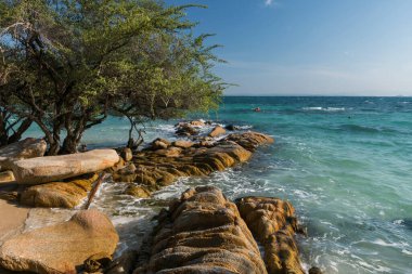Beautiful seascape at Ko Man Klang beach against blue sky in sunny day, Rayong, Thailand. Summer holiday maker or vacation in tropical country, Siam.