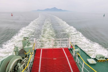 Kyusho Ferry cruise sailing from Shimabara, Nagasaki to Kumamoto ports,. This ship can carry passengers and vehicles across sea. clipart