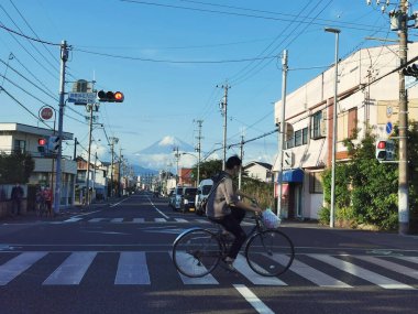 Shimizu, Japan - April 27, 2023: Miho shrine street junction with beautiful mount fuji against blue sky. clipart