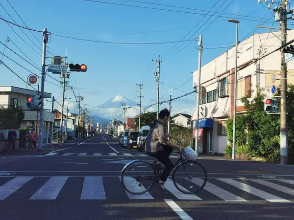 stock image Shimizu, Japan - April 27, 2023: Miho shrine street junction with beautiful mount fuji against blue sky.