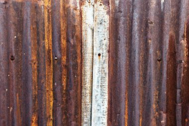 Eski çinko duvardaki paslı resim. Desenli kalıp arkaplanı