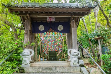 frog statue at entrance gate of Nyoirinji Temple, Ogori, Fukuoka, Japan. Here is famed for toad statue referred to as Kaeru dera, while the formal name is Seieizan Nyoirin-ji. clipart