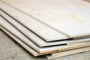 stack of wood plank for construction