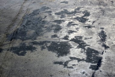 Çatlaklı eski bir taş duvarın dokusu.