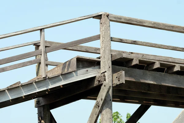 stock image old wooden bridge in the park