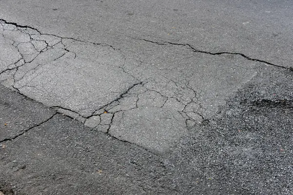 Çatlak asfalt yol arkaplanı