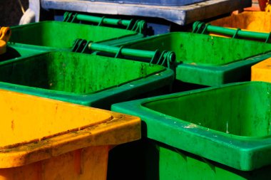 old rusty plastic bin in the city