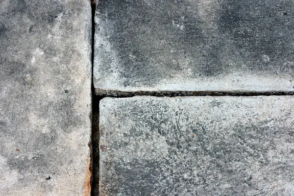 Çatlak desenli eski beton zemin