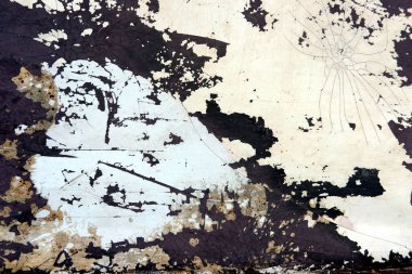 Eski paslı duvar, kabuğu soyulmuş.