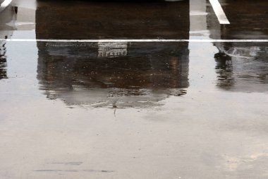 wet car parking in the city