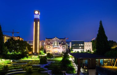 Ladner Clock Tower and Irving K. Barber Learning Centre at Vancouver Campus of University of British Columbia in Canada clipart