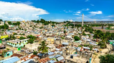 Santo Domingo 'nun fakir mahallelerini teleferik teleferiğinden, Dominik Cumhuriyeti' nin gecekondu mahallelerinden izleyeceğiz.