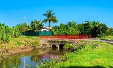 Bridge across a river in Kourou, French Guiana, South America clipart