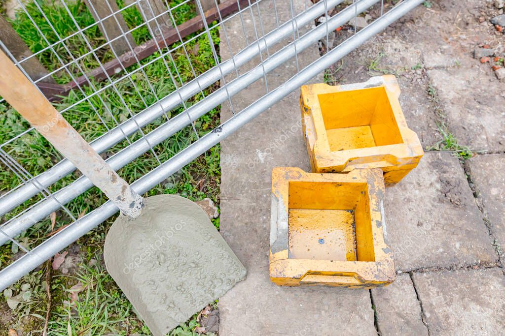 Two cube molds empty, oiled for concrete samples for the tensile