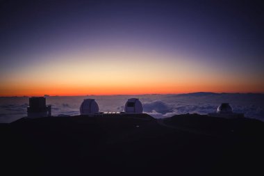 Telescopes dome at sunset on top of Mauna Kea clipart