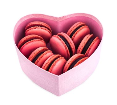 Heart shaped box with pink macarons isolated on white background. Symbol of love. Valentine's Day