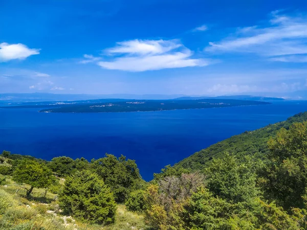 stock image Mountainous coastline of island Cres covered with forest and pristine sea