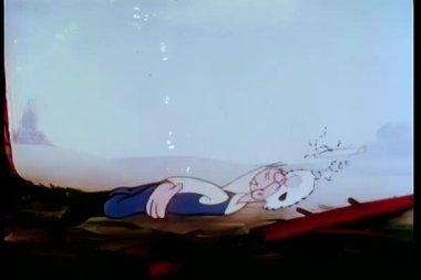 Uyuyan adam önce ağaçların tepesine uçuyor.