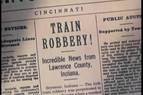 Montage Newspaper Headlines Train Robberies — Stock Video