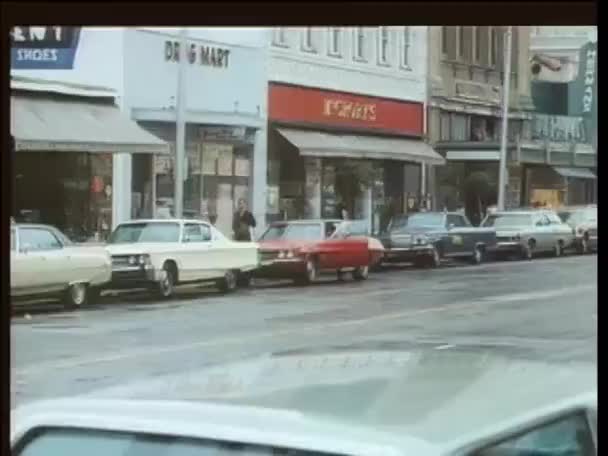 Man Getting Out Parked Car City Street 1970S — Stock Video