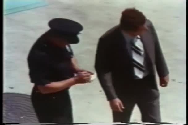 Police Officer Giving Man Ticket — Stock Video
