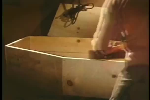 Carpenter Sanding Pine Coffin Background Close — Stock Video