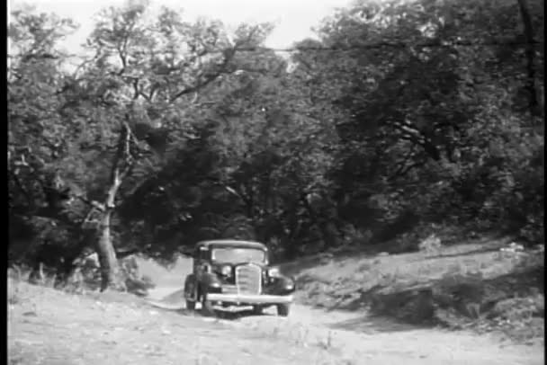 Car Driving Narrow Country Road 1930S — Stock Video