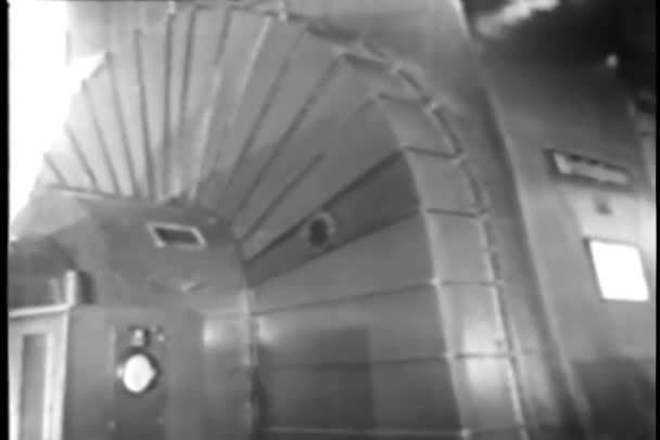 Man Wind Tunnel Walking Electric Motor Reading Meter 1940S — Stock Video