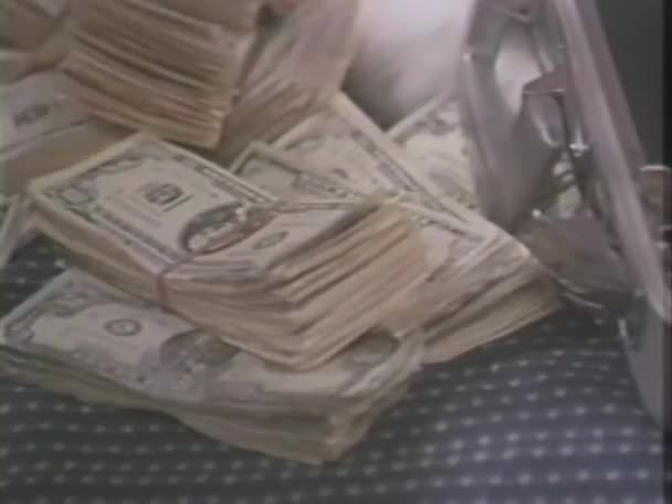 Close Woman Hands Putting Bundles Dollar Bills Suitcase — Stock Video