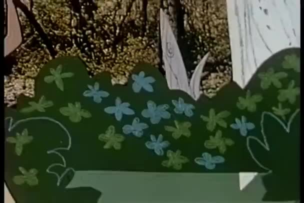 Dibujos Animados Conejo Saltando Los Arbustos — Vídeo de stock