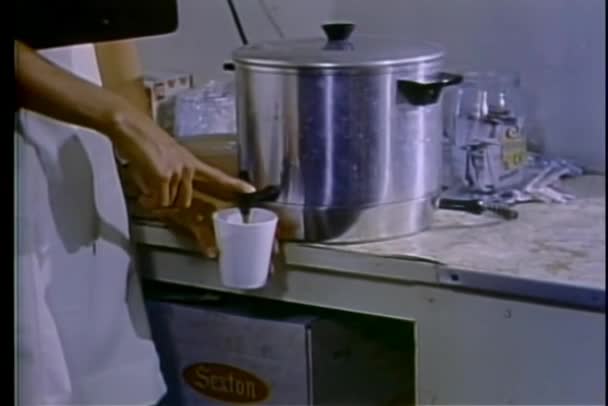 Close Hands Pouring Coffee Out Urn — Stock Video