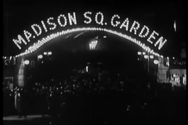 Crowd Milling Neon Madison Square Garden Marquee 1930S — Stock Video