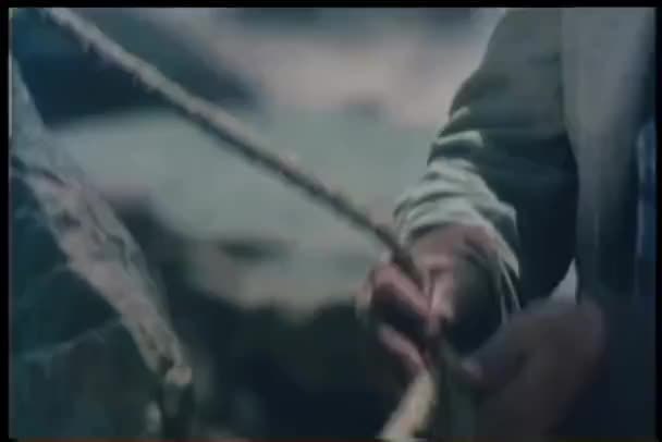 Medium Shot Man Tying Rope Rock — Stock Video
