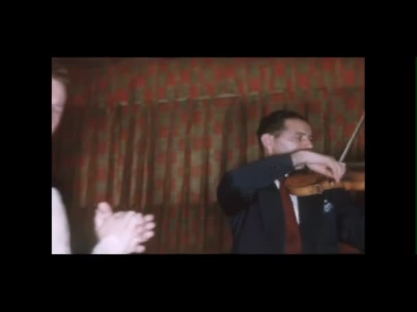 Violinist Performing While Newlywed Couple Dances — Stock Video