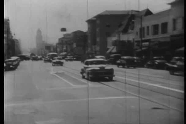 Car Turning Street Downtown Los Angeles 1940S — Stock Video