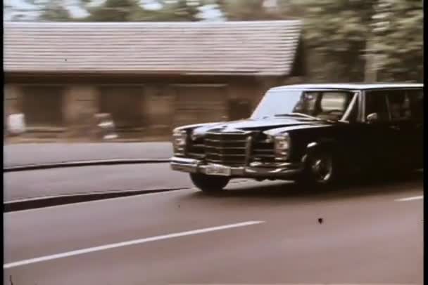 Mercedes Benz Limousine Leaving City — Stock Video