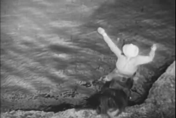 Cowboy Horse Jumping Cliff River 1930S — Stock Video