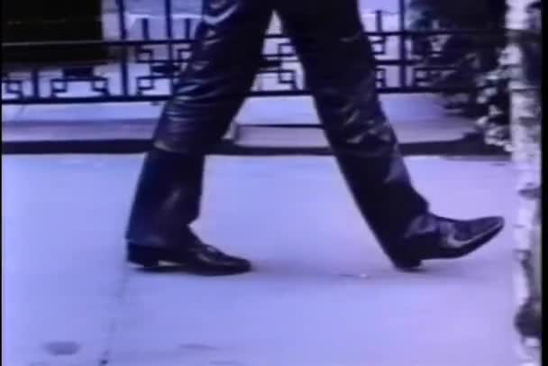 Lower Half Man Wearing Black Leather Pants Walking Street — Stock Video