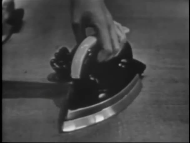 Close Woman Placing Vintage Iron Holder — Stock Video