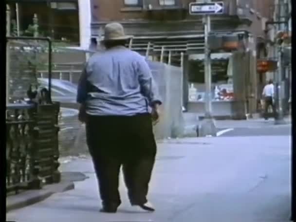 Rear View Obese Man Scratching Buttock While Walking Street — Stock Video