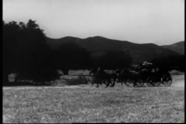 Cowboys Racing Two Stagecoaches Plains 1930S — Stock Video