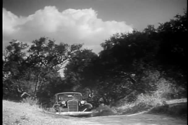 Car Slowly Navigating Hilly Country Road 1930S Stock Video