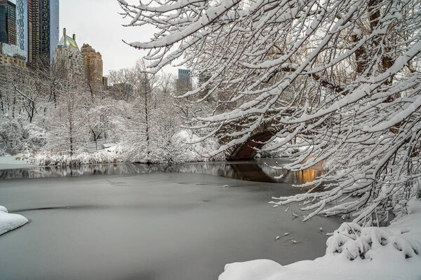 Gapstow Bridge in Central Park after snow storm, early morning