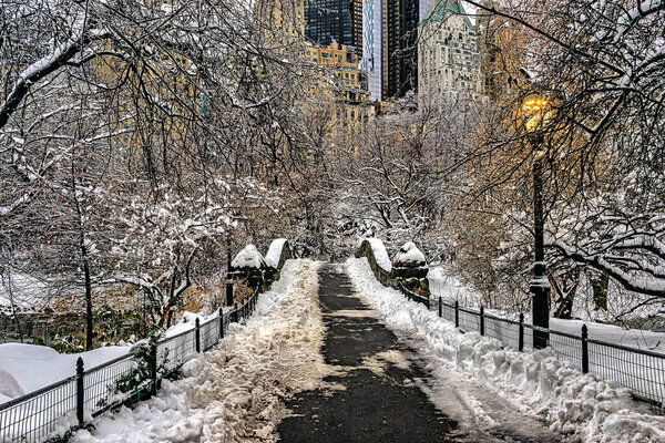 Gapstow Bridge in Central Park after snow storm in the early morning