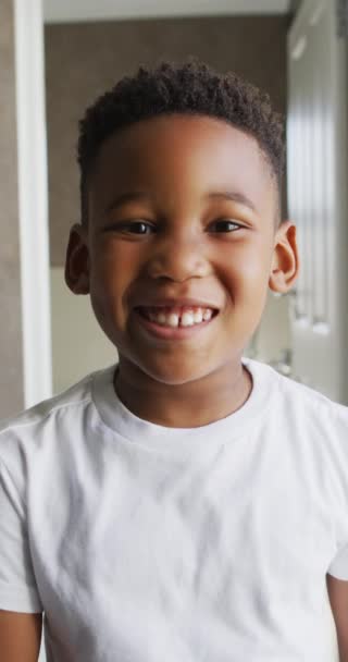 Vertical Video African American Boy Smiling Camera Childhood Spending Time — Stock Video