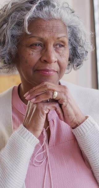 Vertical Video Thoughtful Senior African American Woman Looking Window Retirement — Stock Video