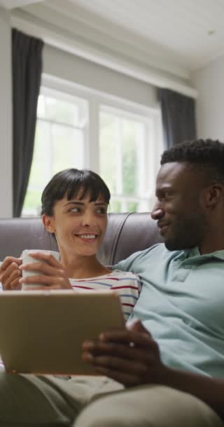 Vertical Video Happy Diverse Couple Using Tablet Home Family Spending — Stock Video
