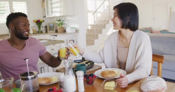 Happy Diverse Couple Sitting Table Having Breakfast Spending Quality Time — Vídeos de Stock