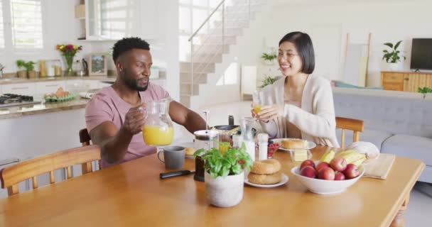 Happy Diverse Couple Sitting Table Having Breakfast Spending Quality Time — Video Stock